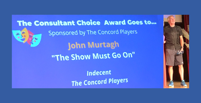 John Murtagh accepts a Consultant Choice Award
for valiant efforts as Stage Manager.